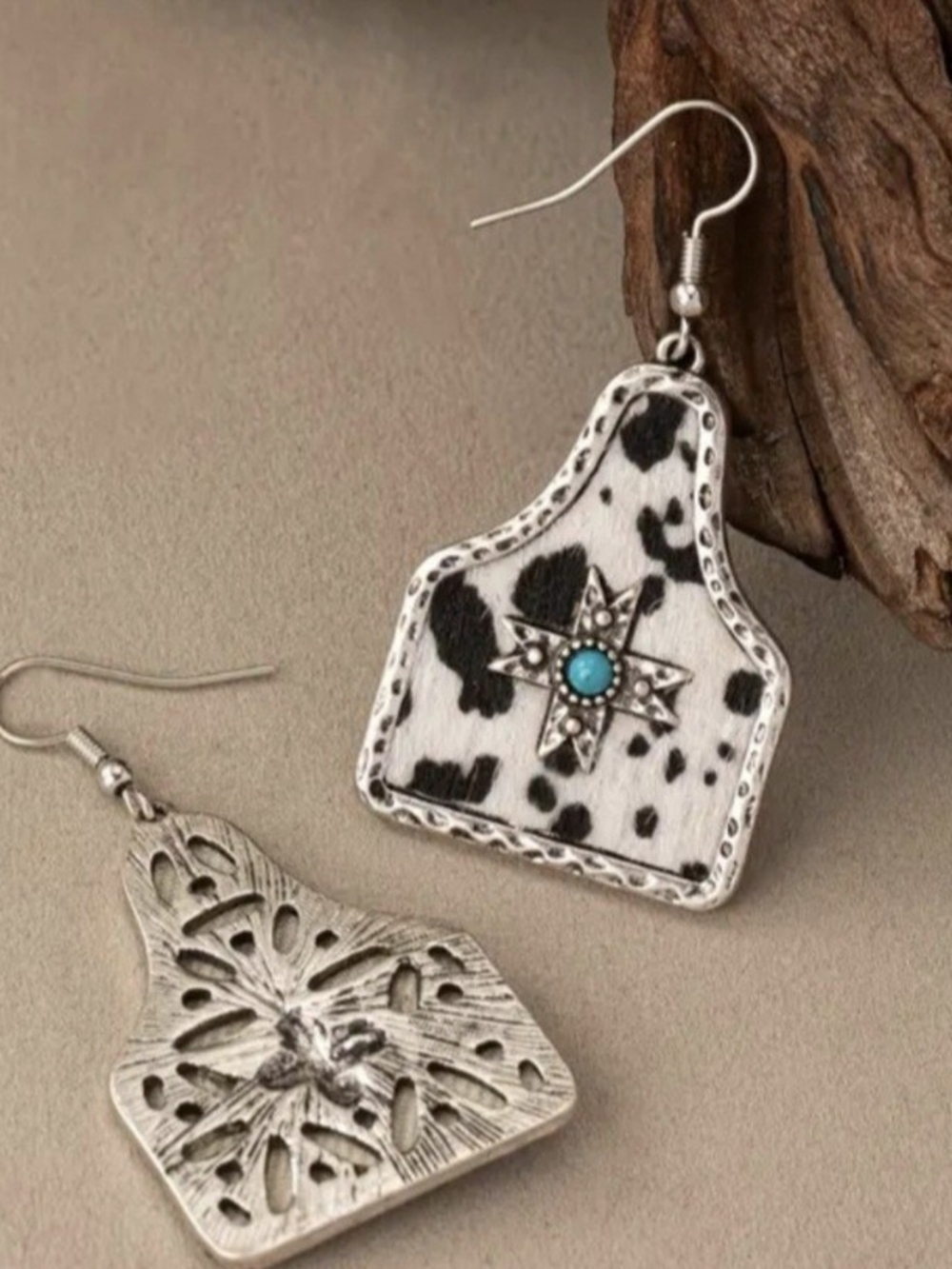Wrangler Black & White Cowhide Earrings with Turquoise Star Accent